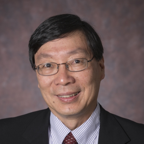 head shot of an Asian male with short black hair with eyeglasses wearing a black suit, light blue and white striped shirt, and a maroon tie