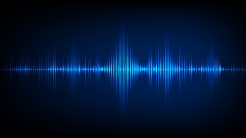 Image of sound waves oscillating in blue against a black background.