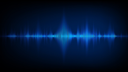 Image of sound waves oscillating in blue against a black background.